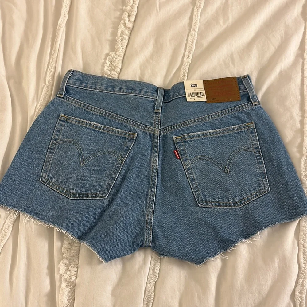 NWT Levi’s 501 denim shorts with raw hem. Size 30. Measurements in pics. - Picture 2 of 10